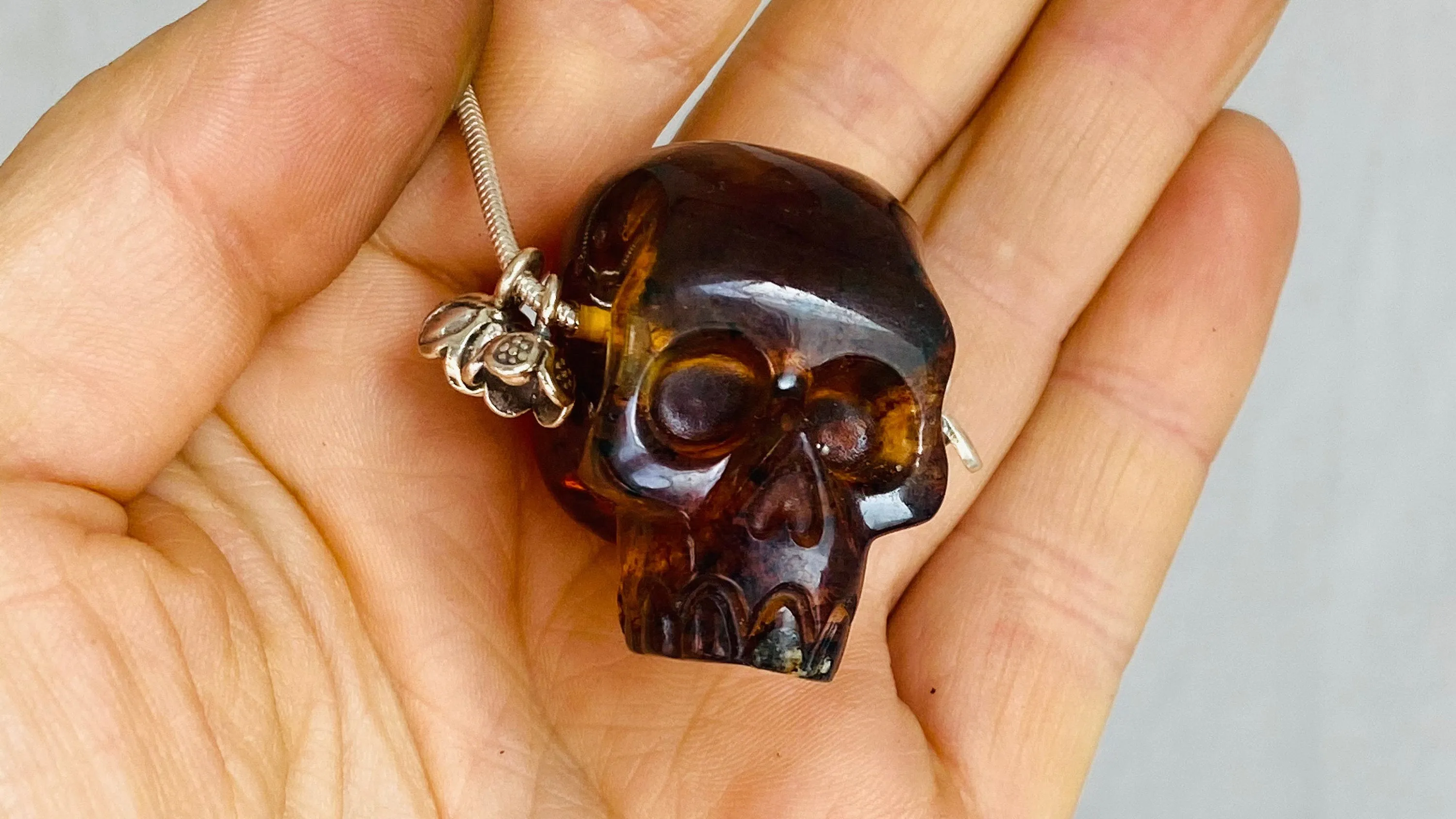 Amber Skull Pendant on Sterling Silver Snake Chain.