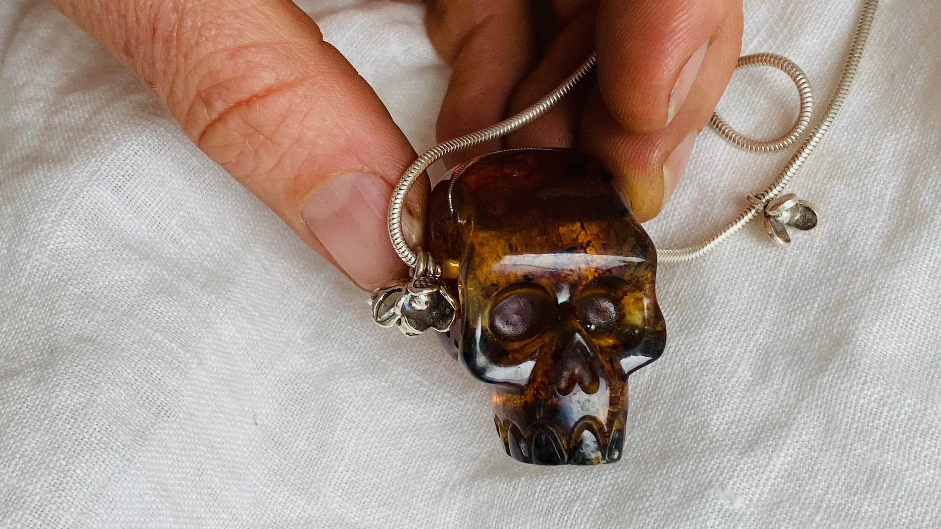 Amber Skull Pendant on Sterling Silver Snake Chain.