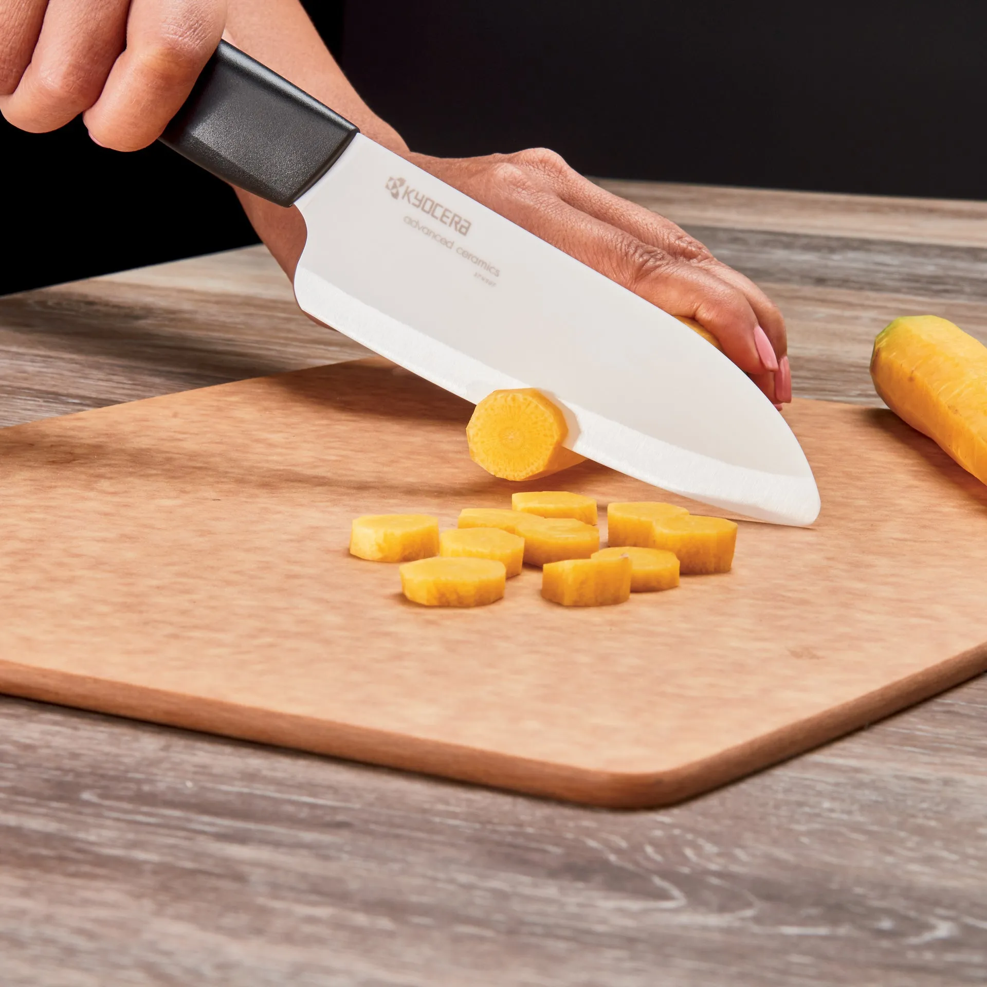 Kyocera Advanced Ceramic Revolution Series 5 1/2 inch Santoku Knife – Black
